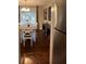 Dining area with laminate wood floors, stylish furniture, and natural light at 1672 Cedar Bluff Way, Marietta, GA 30062