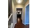 Hallway entrance view of the living room with hardwood floors at 1672 Cedar Bluff Way, Marietta, GA 30062
