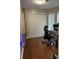 Bright office with laminate wood floors, closet, and natural light from window at 1672 Cedar Bluff Way, Marietta, GA 30062