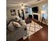 Inviting living room with a fireplace, plush sofa, and a stylish rug at 1672 Cedar Bluff Way, Marietta, GA 30062