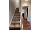 Stairway leading to the living room with view of the hallway entrance at 1672 Cedar Bluff Way, Marietta, GA 30062