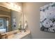 Cozy bathroom featuring a stylish sink and vanity with a floral painting that gives life to the room at 423 Georgia Se Ave # 301, Atlanta, GA 30312