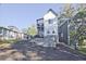 Spacious backyard with a fire pit and a traditional wooden fence at 179 South Se Ave, Atlanta, GA 30315