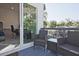 Relaxing balcony with seating area, complemented by natural light and peaceful neighborhood views at 179 South Se Ave, Atlanta, GA 30315