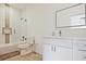 Bright bathroom featuring modern fixtures, vanity with storage, and a shower-tub combination at 179 South Se Ave, Atlanta, GA 30315