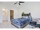 Bright bedroom features an organized bookshelf headboard and a connected bathroom at 179 South Se Ave, Atlanta, GA 30315