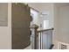 Hallway featuring stylish sliding barn door and a laundry area at 179 South Se Ave, Atlanta, GA 30315