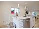 Clean kitchen island with stainless steel dishwasher, sink and ample counter space at 179 South Se Ave, Atlanta, GA 30315