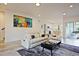 Inviting living room featuring hardwood floors, white walls, and modern furniture at 179 South Se Ave, Atlanta, GA 30315