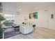 Open-concept living room with modern furniture, hardwood floors, and natural light at 179 South Se Ave, Atlanta, GA 30315