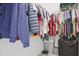 Organized walk-in closet with ample hanging space for clothing and accessories at 179 South Se Ave, Atlanta, GA 30315