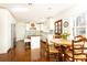 Spacious kitchen featuring wood flooring, a center island, and stainless appliances at 3034 Farmington Se Dr, Atlanta, GA 30339