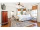 Serene main bedroom with a large bed, neutral tones, and ample natural light at 3034 Farmington Se Dr, Atlanta, GA 30339