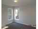 A bedroom featuring two windows at 3975 Broadleaf Walk, Ellenwood, GA 30294