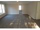 A carpeted living room featuring a window at 3975 Broadleaf Walk, Ellenwood, GA 30294