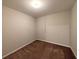 Finished basement space with a small window and neutral paint at 8271 Walnut Dr, Jonesboro, GA 30238