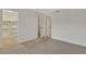 Empty bedroom with walk-in closet and two additional closets at 9 Ivy Gates Ne, Atlanta, GA 30342