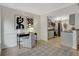 Bright office nook with a desk and chair that opens to the kitchen at 9 Ivy Gates Ne, Atlanta, GA 30342