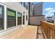 Private balcony with wood flooring and views of the surrounding neighborhood at 2125 Burnside Nw Dr, Atlanta, GA 30318