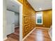 Stylish bedroom with bold geometric wallpaper and hardwood floors at 2125 Burnside Nw Dr, Atlanta, GA 30318