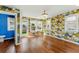 Spacious bonus room with modern light fixture, hardwood floor and attached bath at 2125 Burnside Nw Dr, Atlanta, GA 30318