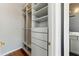 This spacious walk-in closet provides ample storage, including shelving and drawers at 2125 Burnside Nw Dr, Atlanta, GA 30318