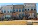 Charming townhome showcasing a classic brick facade and inviting curb appeal at 2125 Burnside Nw Dr, Atlanta, GA 30318