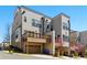 Three-story townhouse with attached garage at 2125 Burnside Nw Dr, Atlanta, GA 30318