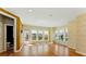 Bright and airy living room with many windows and stylish wallpaper at 2125 Burnside Nw Dr, Atlanta, GA 30318