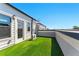 Rooftop patio offers outdoor area with artificial turf and skyline views at 2125 Burnside Nw Dr, Atlanta, GA 30318