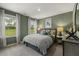 Stylish bedroom with green walls, large windows, and coordinated decor at 2493 Cotton Ln, Douglasville, GA 30135