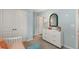 Bright bedroom offers storage, mirror, and decorative touches at 2493 Cotton Ln, Douglasville, GA 30135