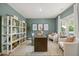 Stylish home office with natural light, ample storage, and comfortable seating at 2493 Cotton Ln, Douglasville, GA 30135