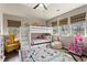 Bright bedroom boasts a bunk bed and a playful atmosphere, perfect for creative play at 305 Norwood Ne Ave, Atlanta, GA 30317