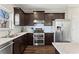 Well-equipped kitchen featuring stainless steel appliances and plenty of cabinets for storage, great for meal prep at 305 Norwood Ne Ave, Atlanta, GA 30317