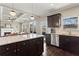 Open-concept kitchen with granite countertops, stainless steel appliances and ample cabinet space, great for cooking at 305 Norwood Ne Ave, Atlanta, GA 30317