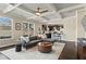 Open-concept living room adjacent to the kitchen and dining area provides ample space for entertaining and relaxation at 305 Norwood Ne Ave, Atlanta, GA 30317