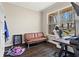 Home office with hardwood floors, a daybed, and a large window view at 305 Norwood Ne Ave, Atlanta, GA 30317