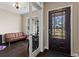 Home office with large window and a view of front yard through front door window at 305 Norwood Ne Ave, Atlanta, GA 30317