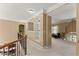 This bonus room features built-in shelving and view to the living room at 6165 Lake Oak Lndg, Cumming, GA 30040