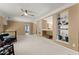 A large bonus room with built-in shelves and cabinets, as well as lots of space at 6165 Lake Oak Lndg, Cumming, GA 30040