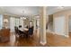 Formal dining room with wood floors and decorative lighting at 6165 Lake Oak Lndg, Cumming, GA 30040