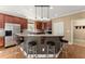 Beautiful kitchen with granite counters, stainless steel appliances, and breakfast bar with seating at 6165 Lake Oak Lndg, Cumming, GA 30040