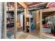 Unfinished basement with storage racks and exposed studs and ductwork at 6165 Lake Oak Lndg, Cumming, GA 30040