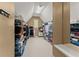 Large walk-in closet with ample shelving and hanging space, perfect for organizing clothes and accessories at 6165 Lake Oak Lndg, Cumming, GA 30040