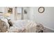 Bright bedroom featuring neutral décor and a window, creating a serene atmosphere at 11841 Rizvan Pl, Covington, GA 30014