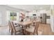 Dining area that seamlessly connects to the kitchen, perfect for Gathering meals and gatherings at 11841 Rizvan Pl, Covington, GA 30014