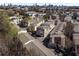 Aerial view of a colorful townhome community showcasing trees, streetscapes, and architecture at 1342 Rietveld Nw Row, Atlanta, GA 30318