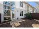 Backyard showing a patio, a fenced yard, and large windows providing a natural light source for the interior at 1342 Rietveld Nw Row, Atlanta, GA 30318