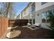 Backyard with privacy fence, and patio seating area perfect for outdoor enjoyment at 1342 Rietveld Nw Row, Atlanta, GA 30318